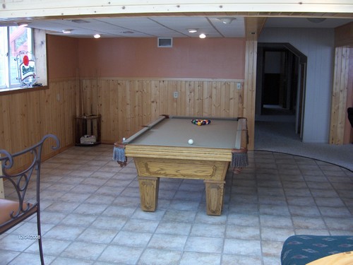 pool table room beautiful addition to the lower level.  very open floor plan.