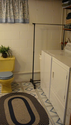 laundry area with a bathroom