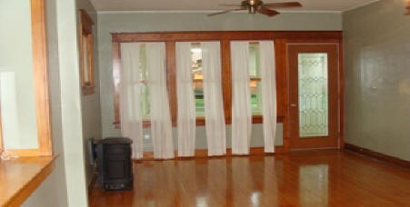 living room. hardwood floors and beautiful woodwork.