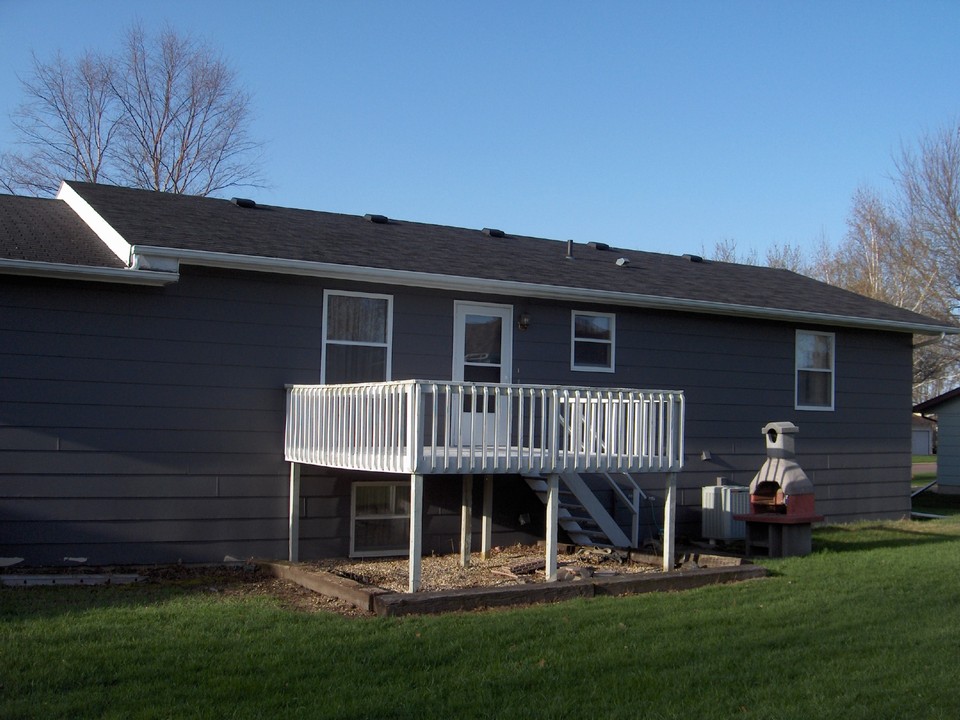 back of house walk out door and deck.