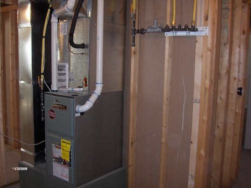 basement forced air furnace and central air.  also extra gas hook ups for a fireplace or other amenity.