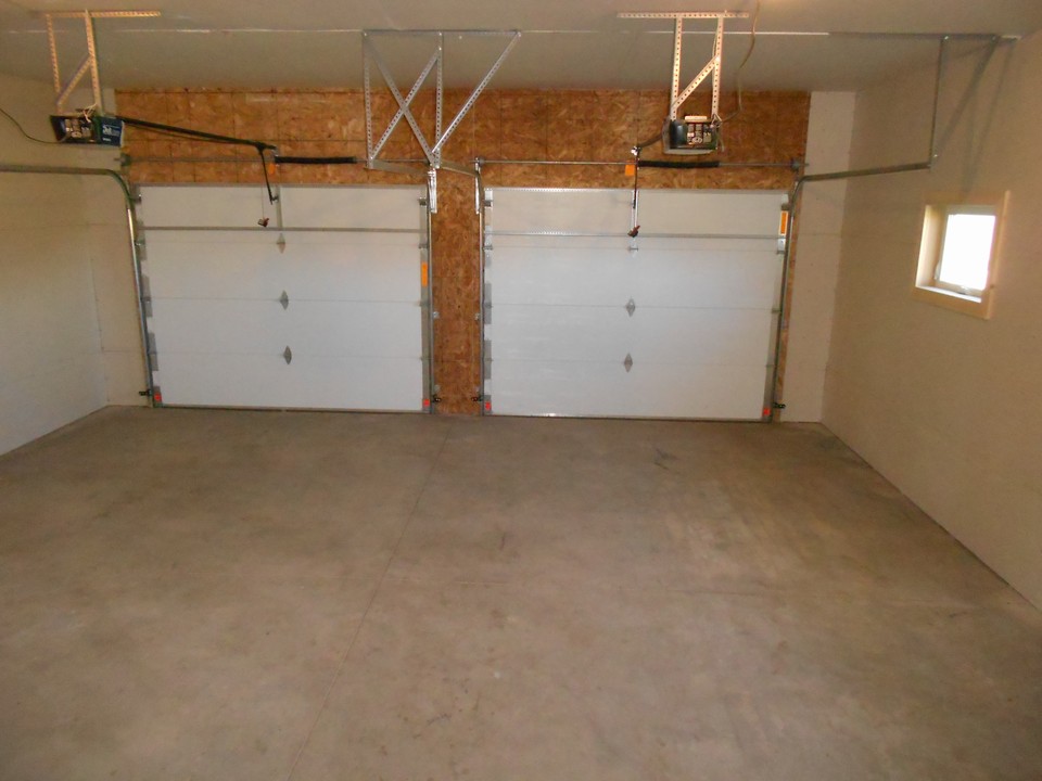 garage 24 by 24.  2 garage door openers.