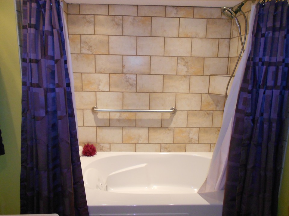 basment bathroom jacuzzi tub and tiled shower