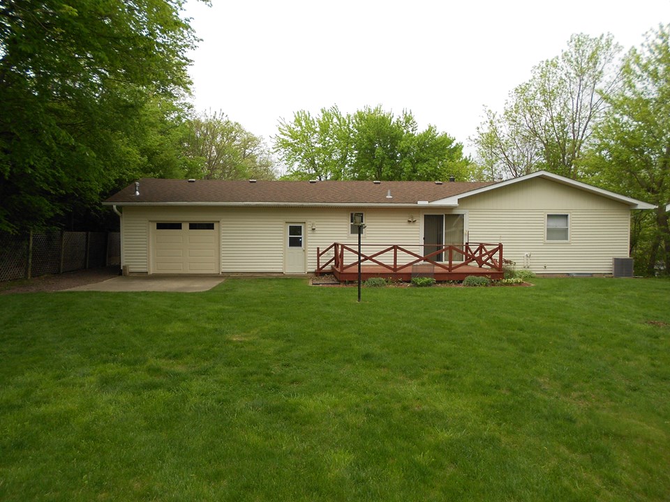 back of home deck, patio, overhead door