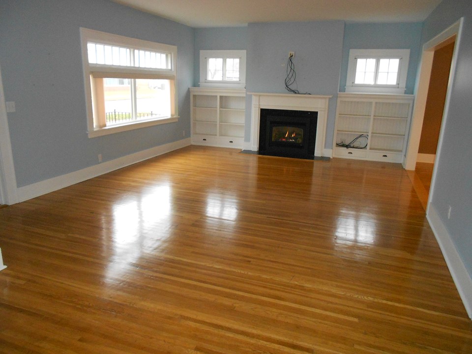 large living room hardwood floors, gas fireplace, built ins, nice windows