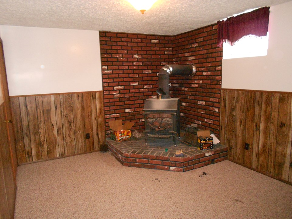 wood burning stove in basement