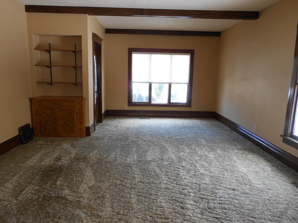 living room high ceilings.  character windows.  nice woodwork.