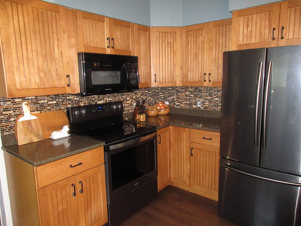kitchen granite countertops, black stainless steel appliances