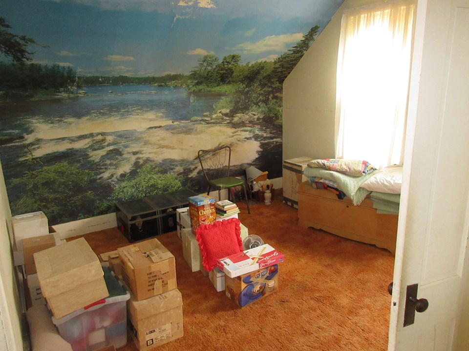 nice size bedroom with a half bath