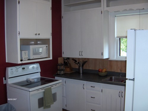 kitchen with stove and microwave
