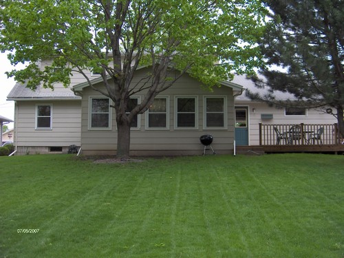 back huge lot with plenty of room.  nice trees.  deck with entry to house and garage.