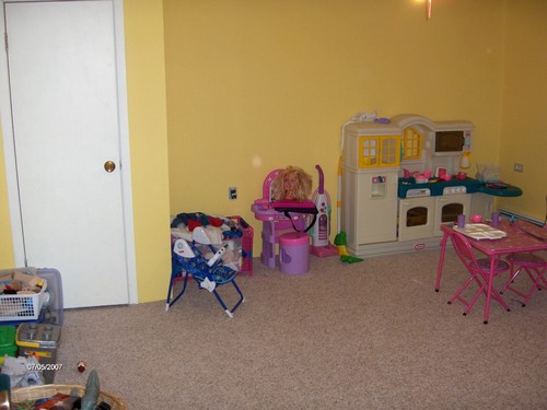 basement play room that is private.  other than an egress window, this would make a great bedroom.