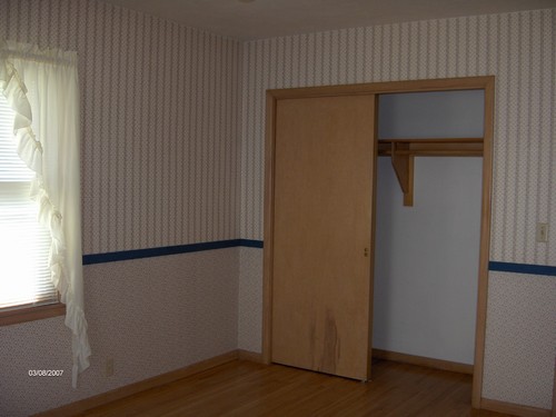 bedroom view with closet