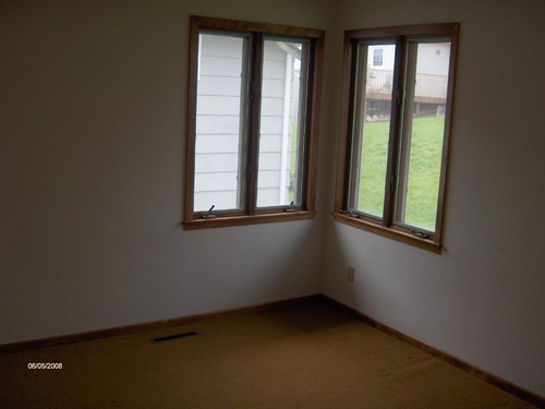 one of three bedrooms