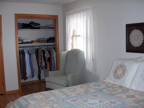 master bedroom hardwood floors and big multiple closets