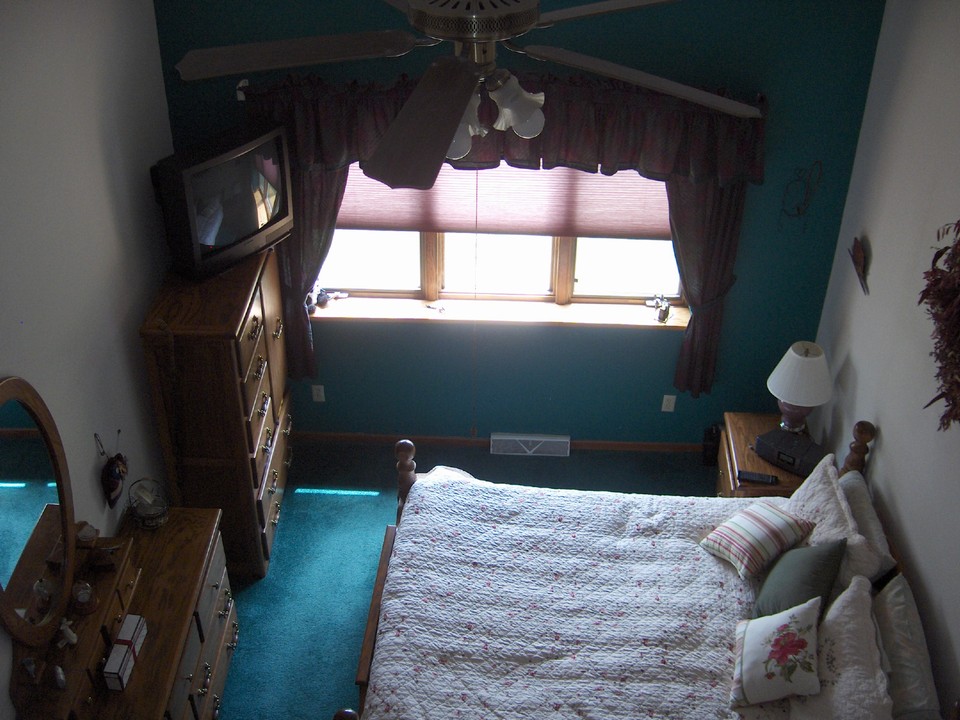 master bedroom taken from open reading area above