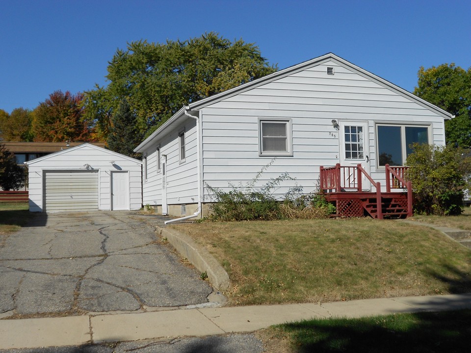 front of home new roof in 2011. oversized single stall garage.