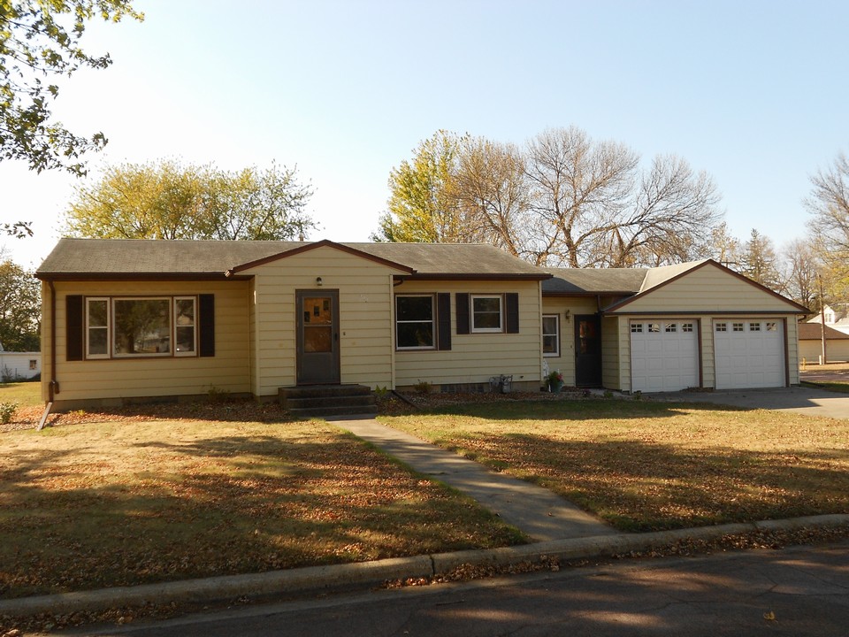 front of home large corner lot, double attached garage