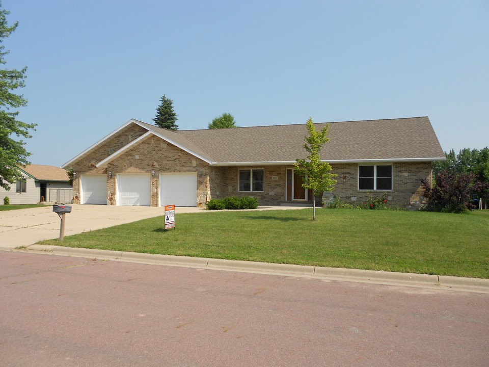 front of home 3 car garage, brick siding, new landscaping