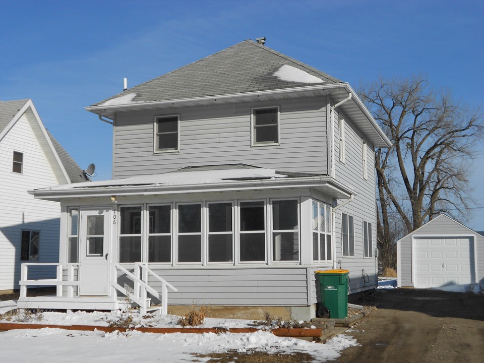 front of home some new landscaping, new garage door, vinyl siding, good location, modern windows