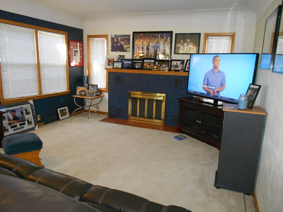 living room wood burning fireplace