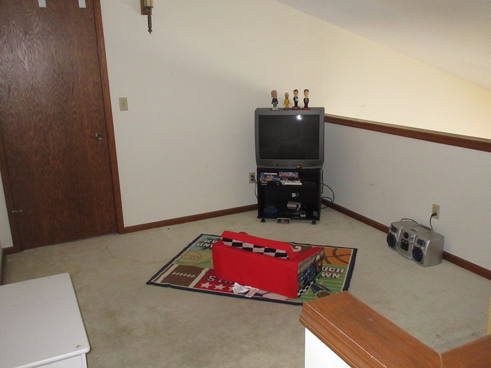 loft overlooking the master bedroom