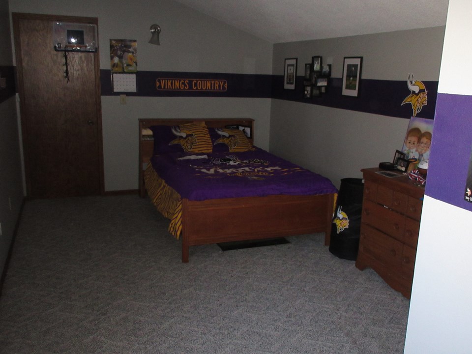 upstairs bedroom through the door is the upstairs bathroom