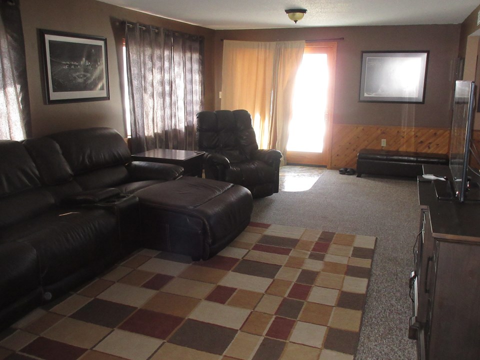 family room patio doors lead to backyard