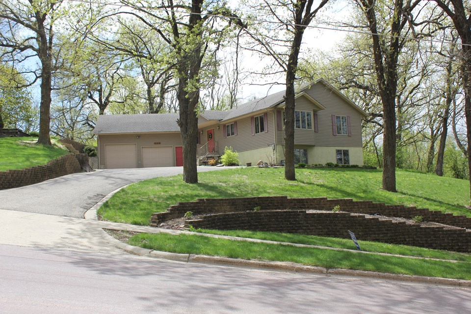 front of home beautiful landscaping and structure for great curb appeal