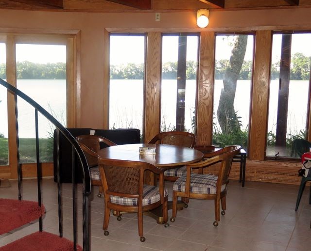 basement family room walk out basement. windows to the lake.