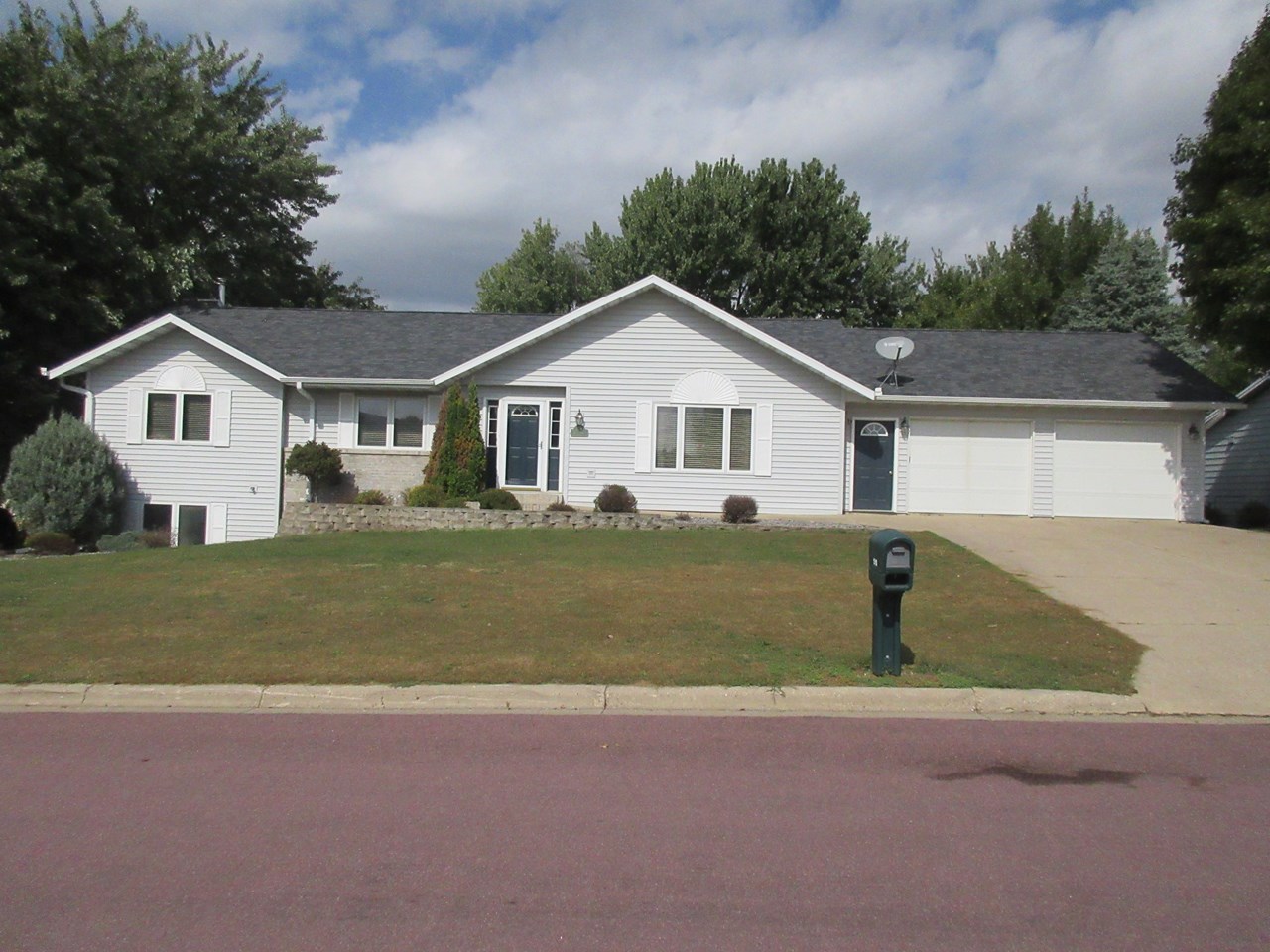 front of house new roof in 2024. walk out basement. 2 car attached garage. newer landscaping.