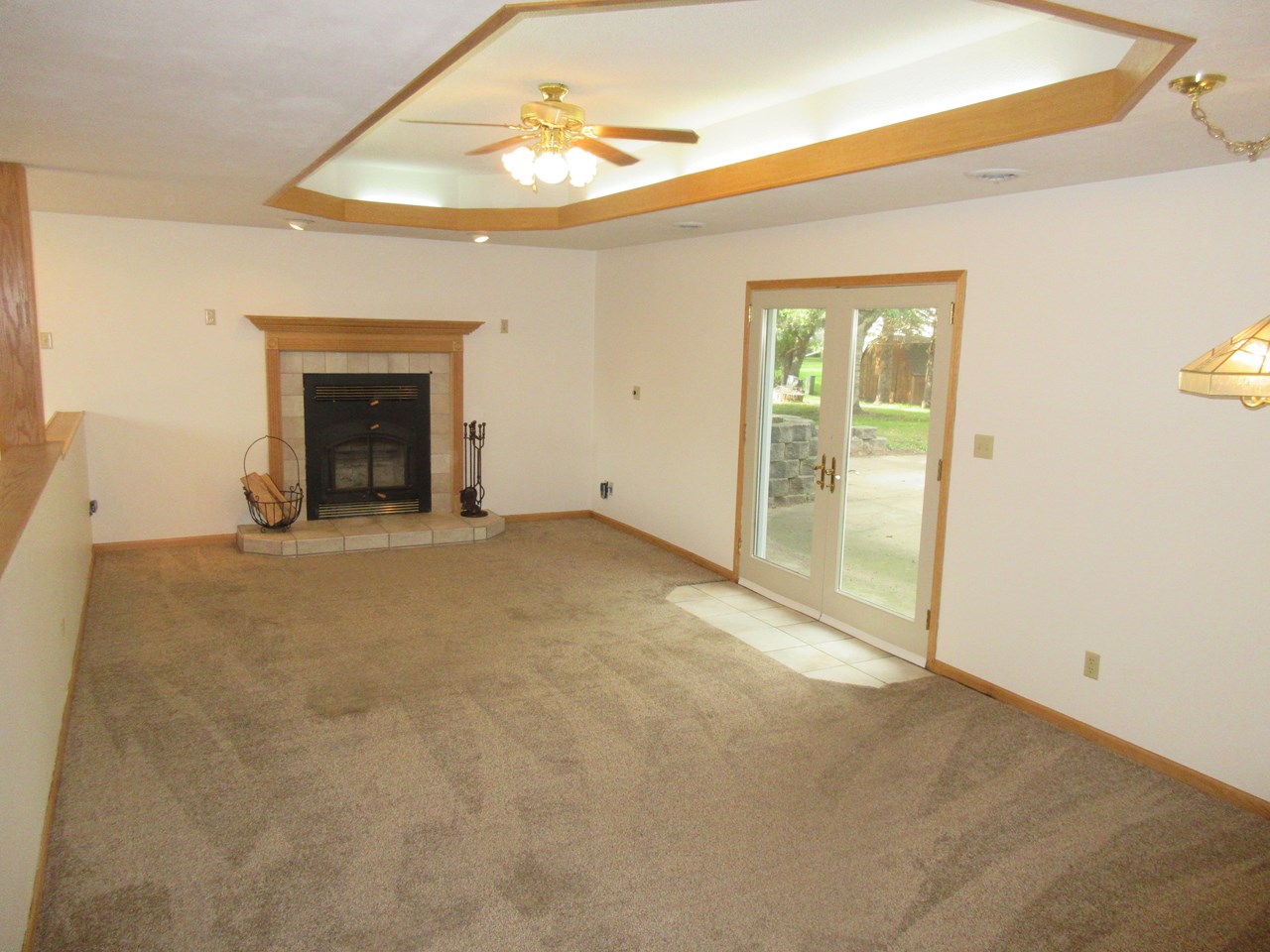 family room wood burning fireplace that has the gas line ran to it for conversion.