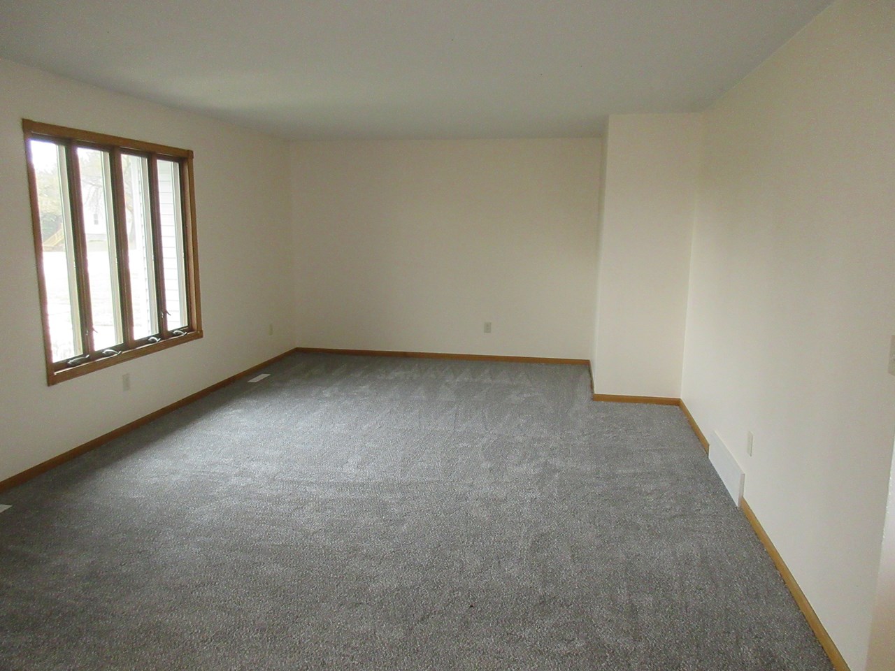 large living room new carpet and paint