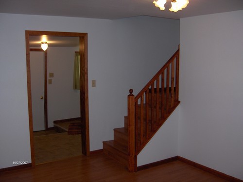 open stairway also shows front foyer