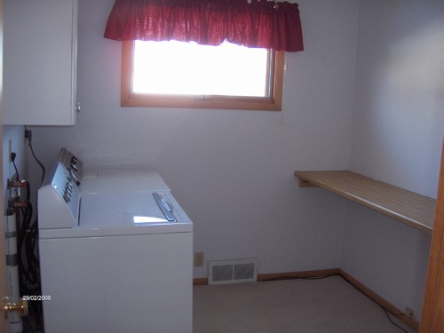 laundry room on main floor, can be made into bedroom