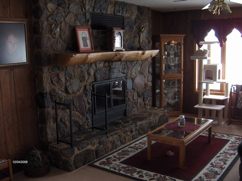 main floor fireplace made from field rock.