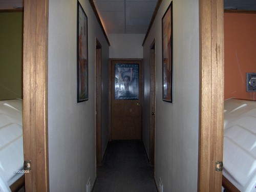 hallway leading to rooms