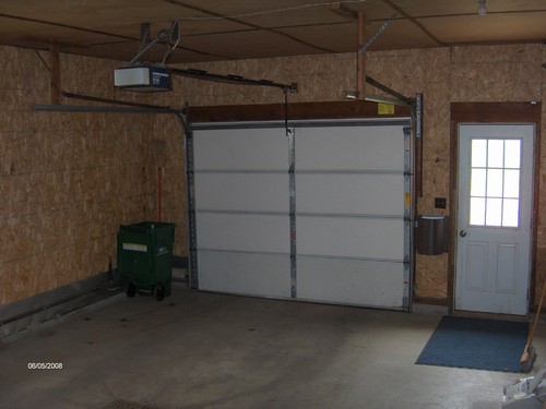 garage the garage is insulated and has an opener, walk out door and windows.