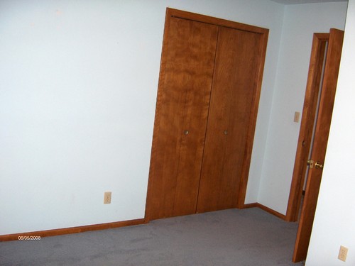 one of three bedrooms
