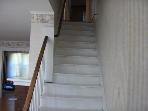 open stairway to bedrooms