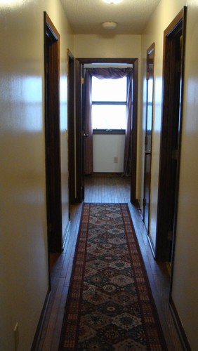 hallway to bedrooms and bathroom.