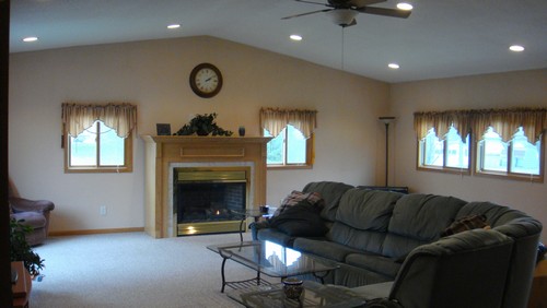 upstairs great room vaulted ceilings, gas fireplace and lot of light.