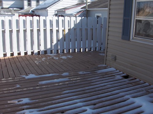 large deck with privacy fence