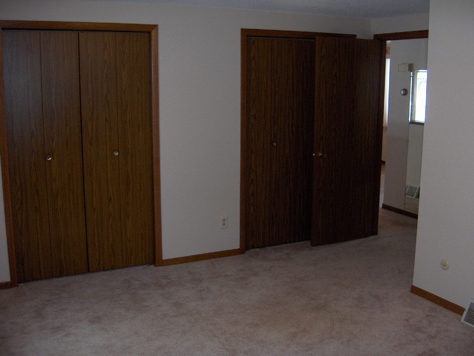 nice sized bedroom with 2 closets