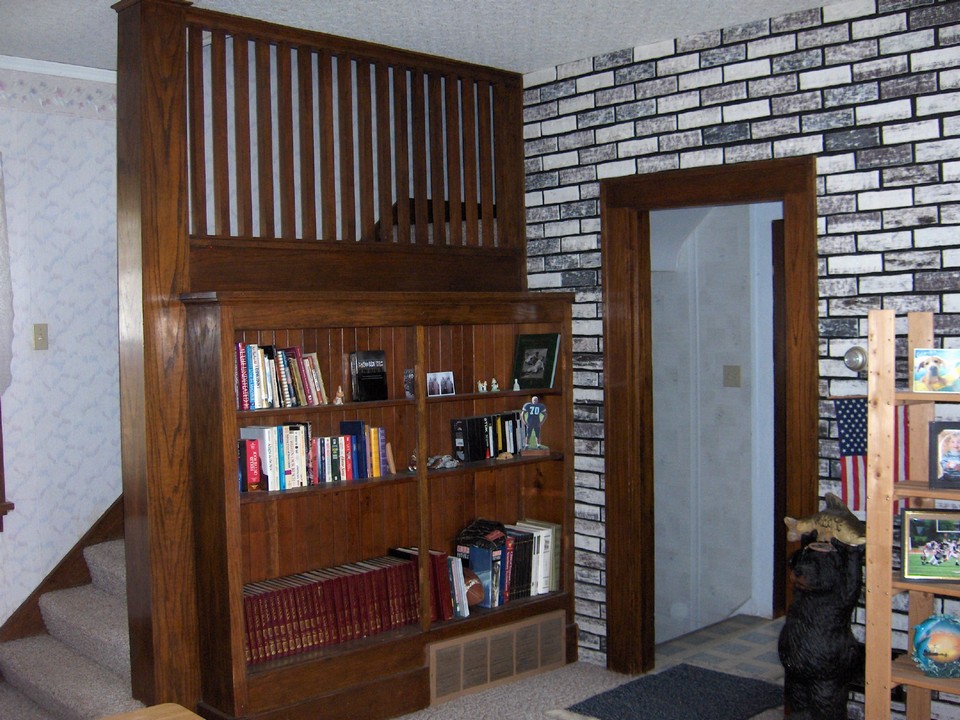 built in bookcase and stairs