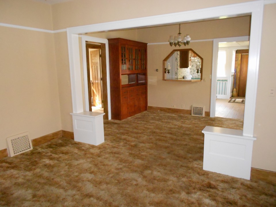 living area hardwood floors under the carpet
