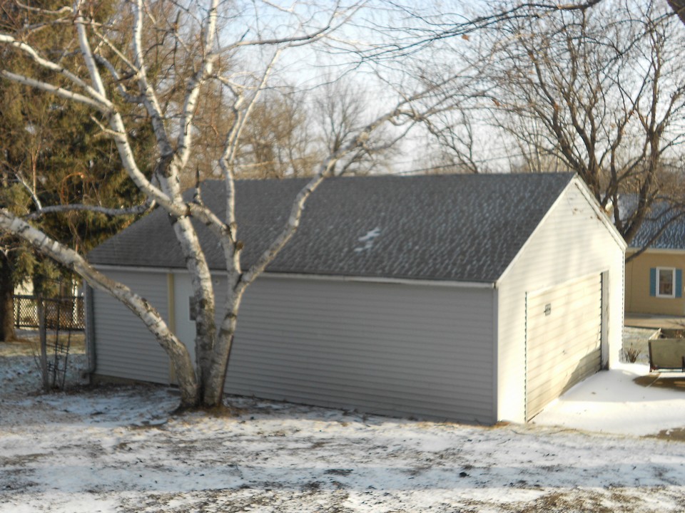 detached double garage new siding and roof