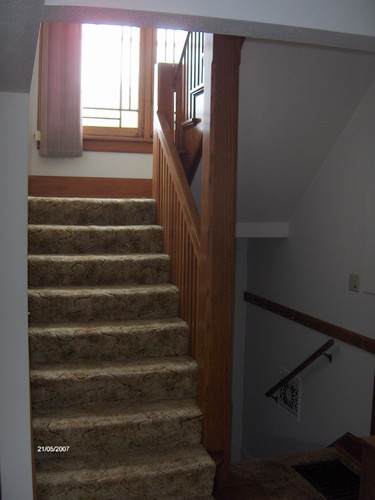 open stairway leading to upstairs