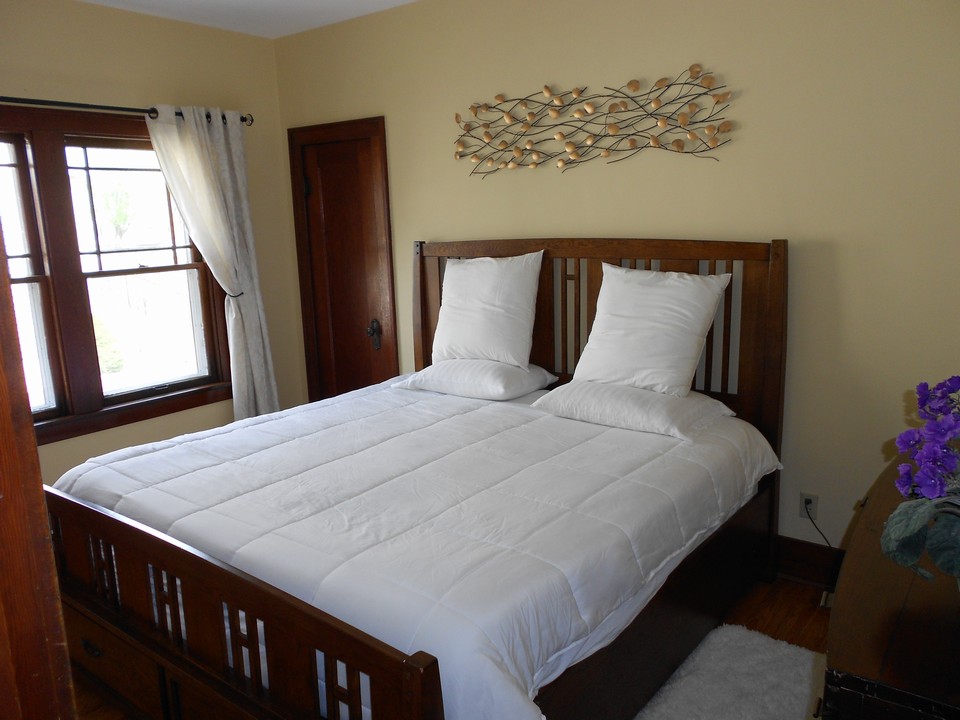 main bedroom hardwood floors, wood trim and doors