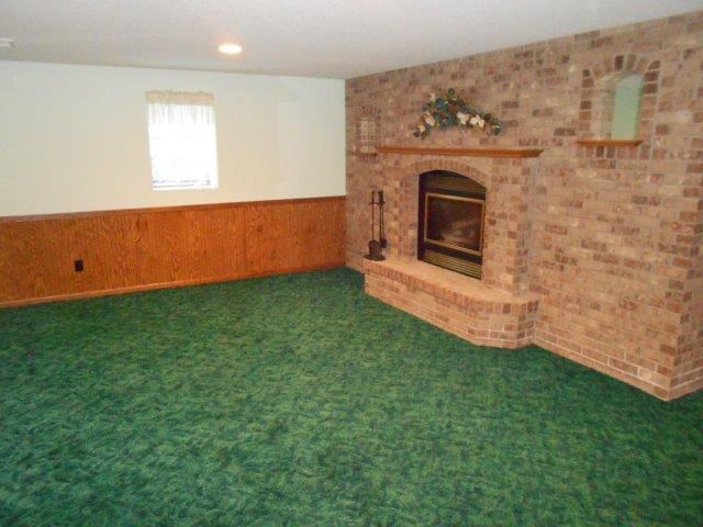finished basement with fireplace